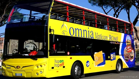 Rome Vatican and hop-on hop-off bus combo passenger boarding with a smartphone ticket